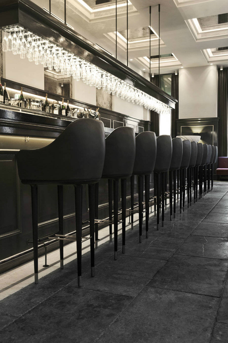 Black bar stools for lounge seating area